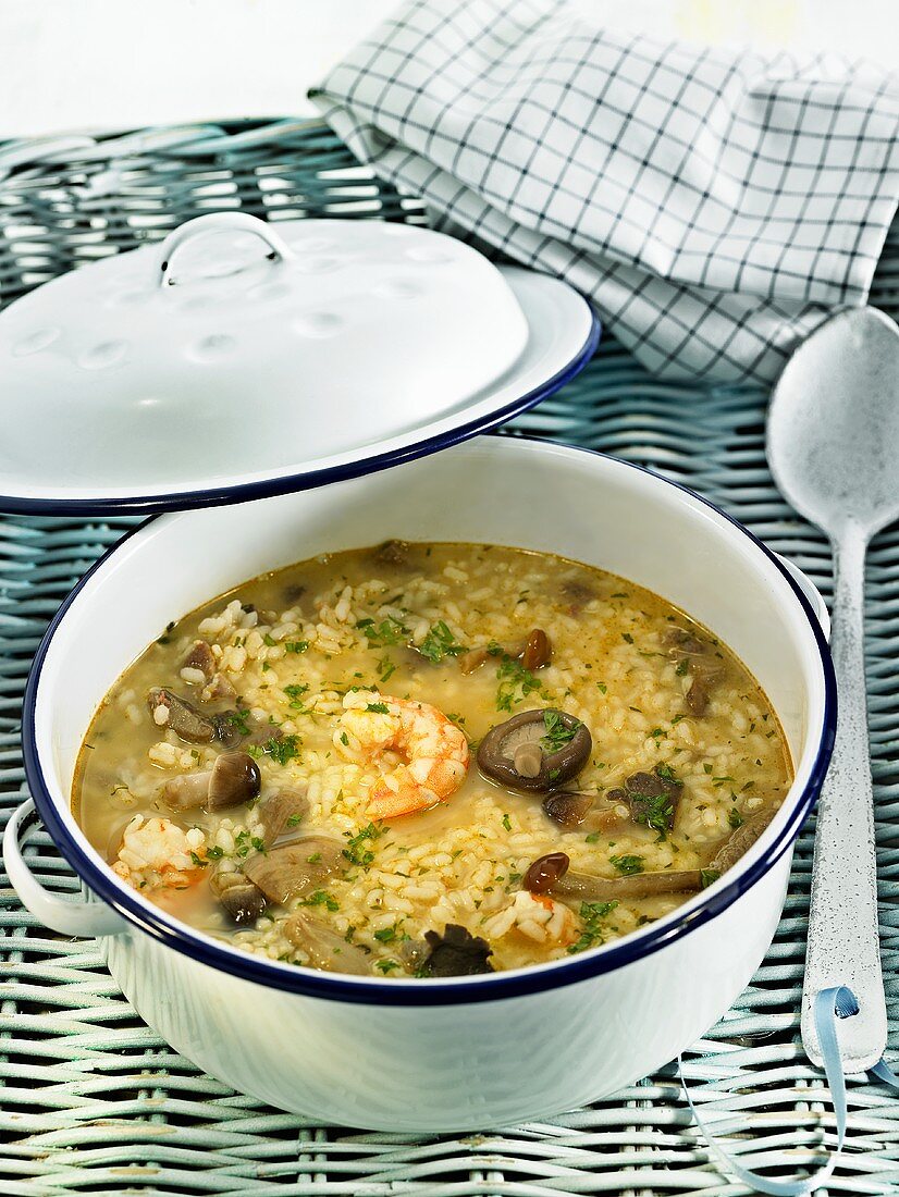 Arroz caldoso (rice soup, Spain) with prawns and mushrooms