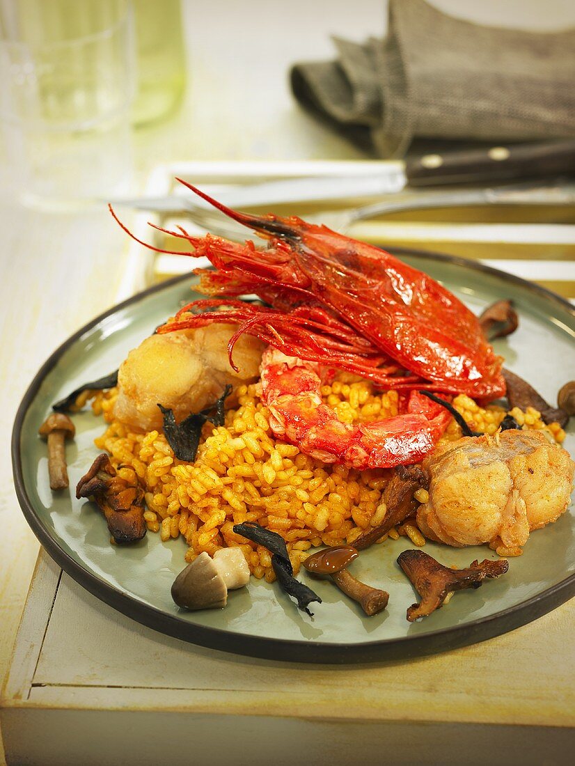 Rice with carabineros (king prawns), monk fish and mushrooms (Spain)
