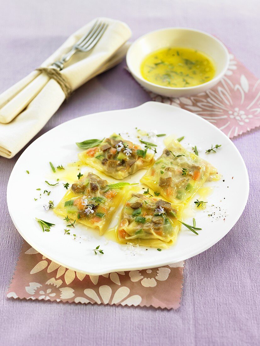 Ravioli with herbs and edible flowers