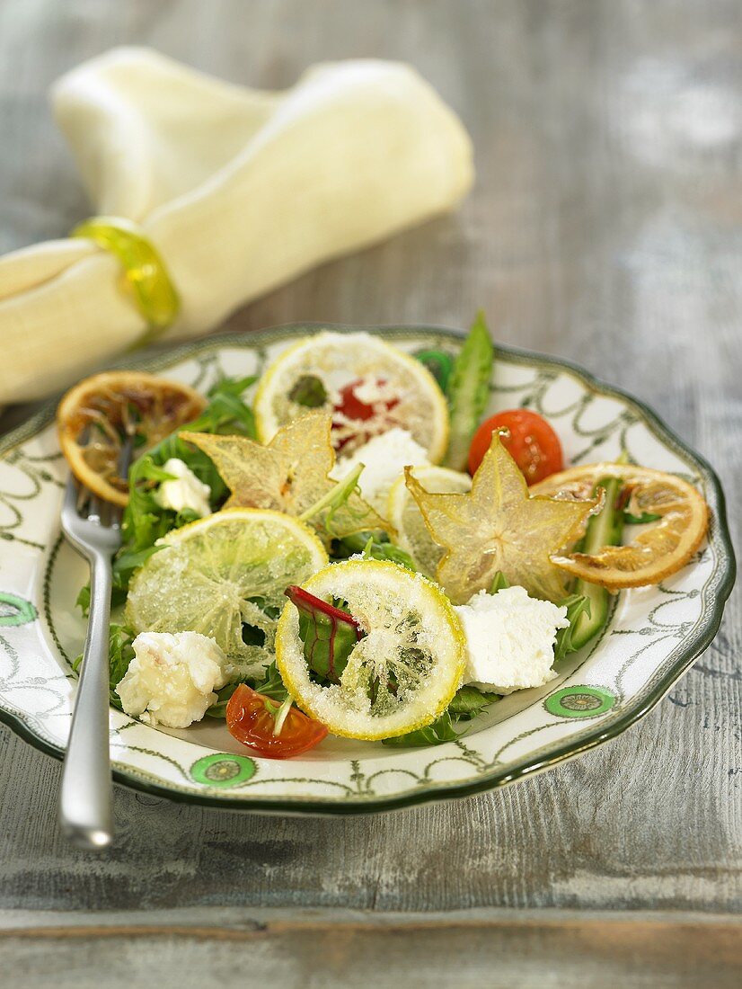 Lemon salad with star fruit and cheese