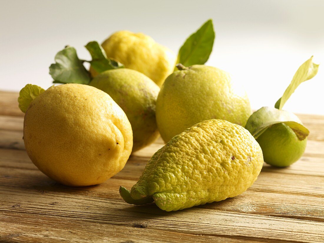 An arrangement of lemons on a wooden table