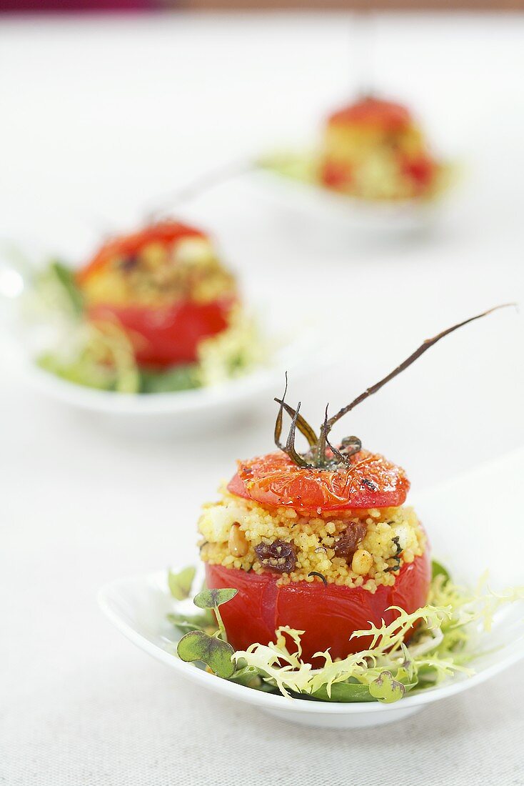 Stuffed tomatoes with couscous salad