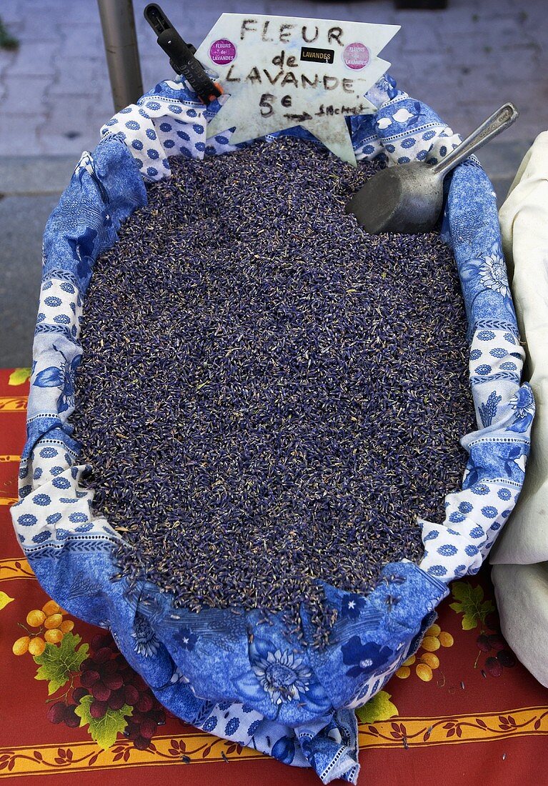 Lavender flowers in a basket at the market in Vaison-La-Romaine, Provence