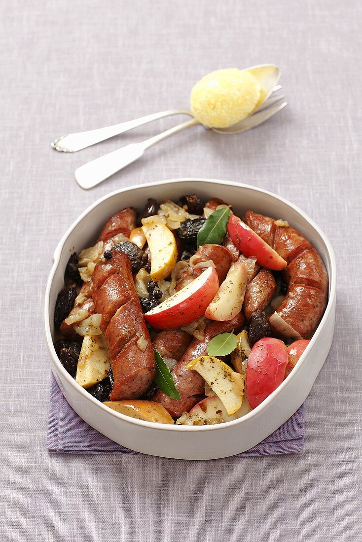 Sausage bake with juniper berries and apples for Easter (Poland)