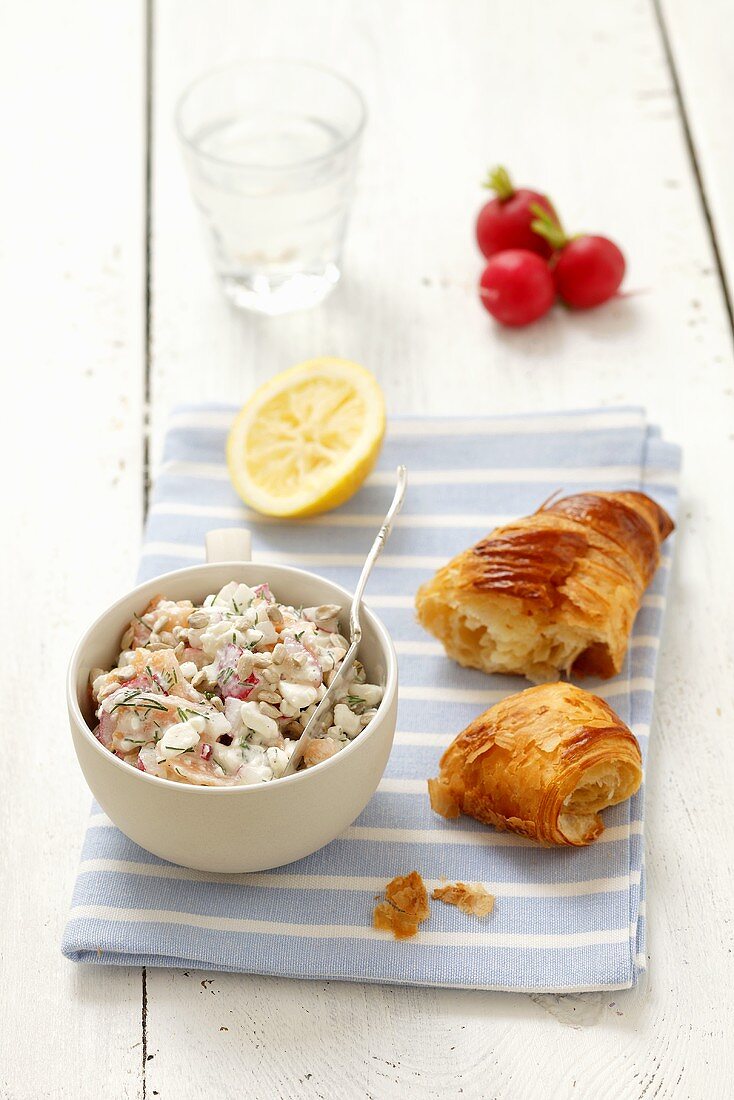 Cottage cheese with smoked salmon, radishes, dill and a croissant