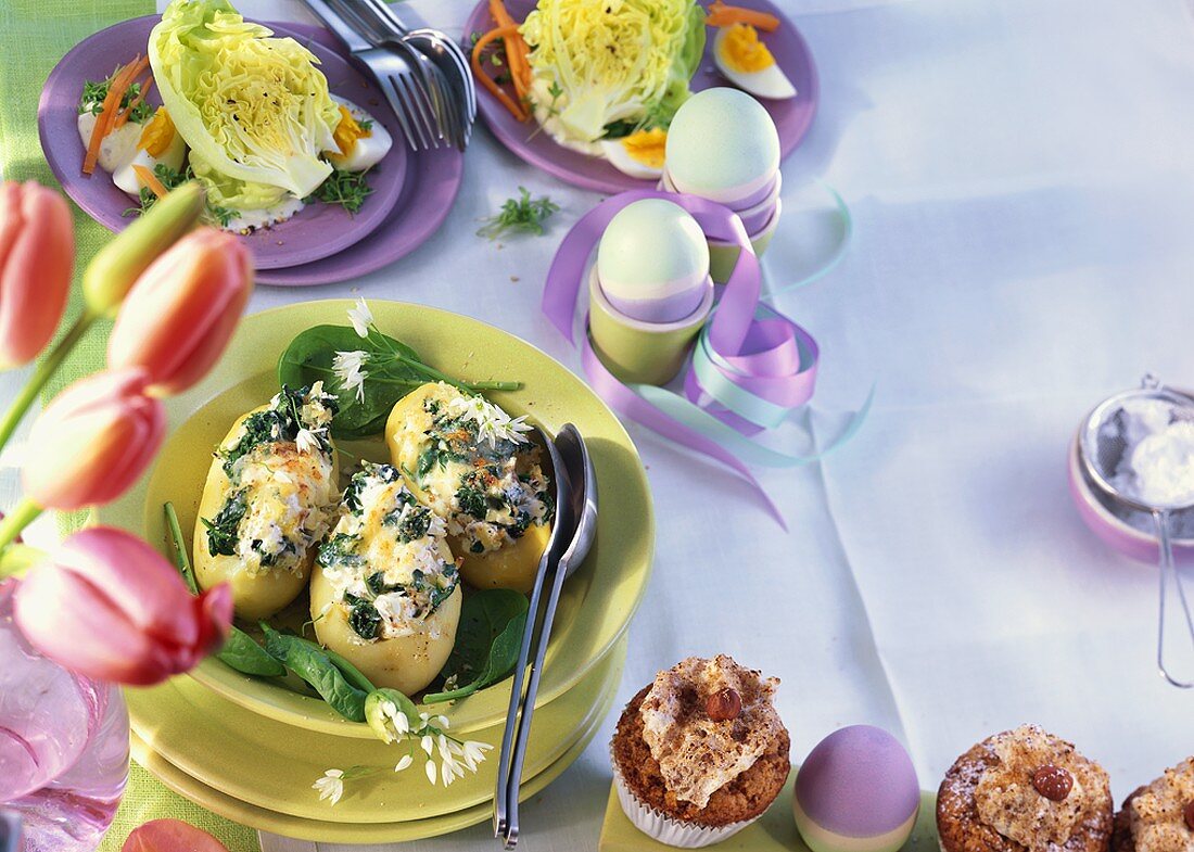 Muffins, potatoes stuffed with spinach & lettuce hearts with egg