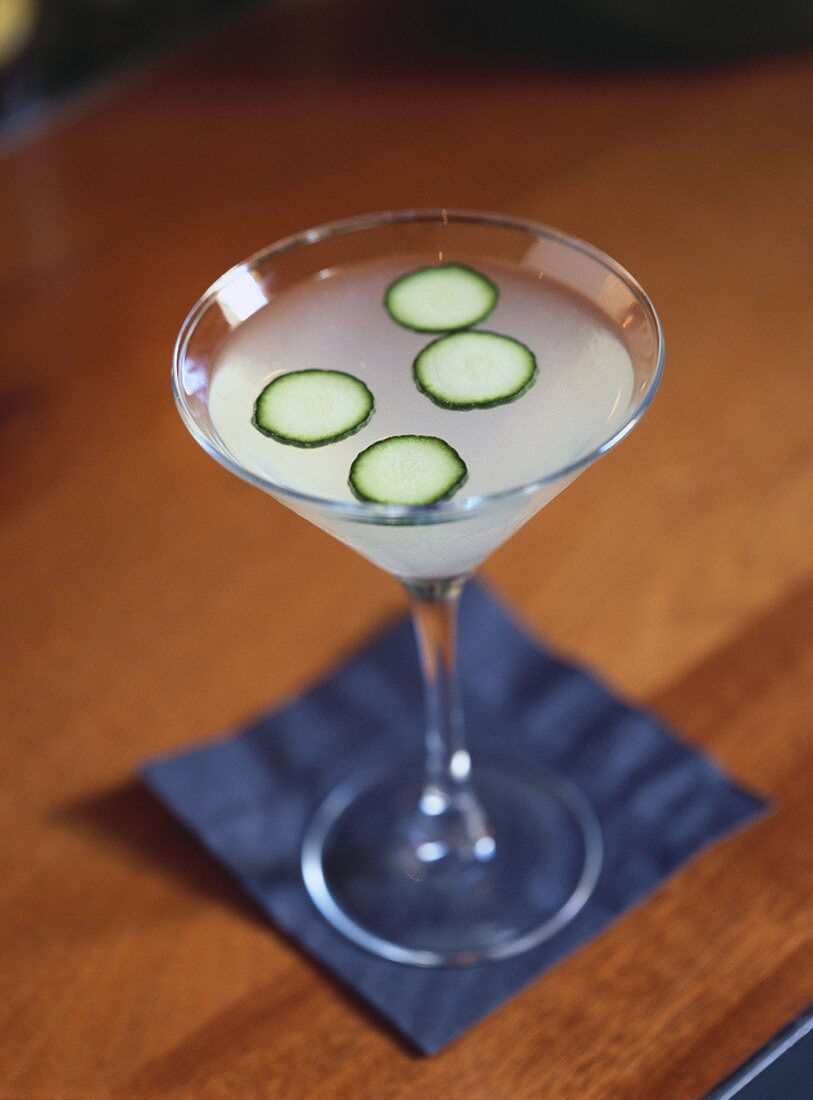 Gimlet with cucumber slices