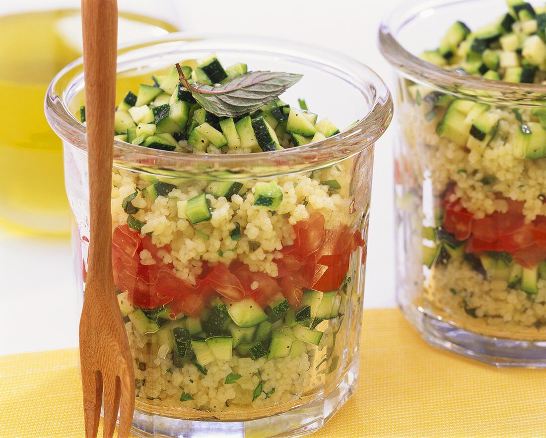 Layered couscous, courgette and tomato salad