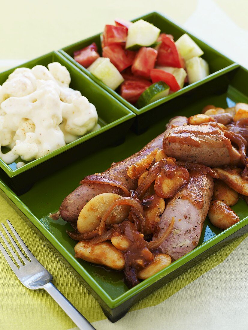 Sausages and baked beans with vegetables