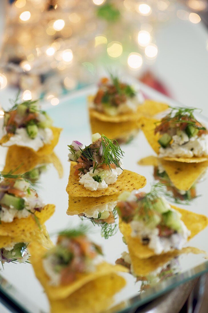 Nachos with soft cheese and smoked salmon