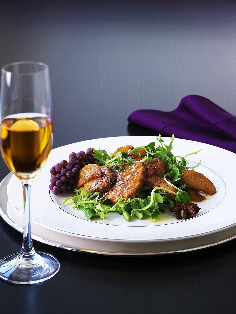 Fried goose liver with caramelised apples & salad, glass of ice wine
