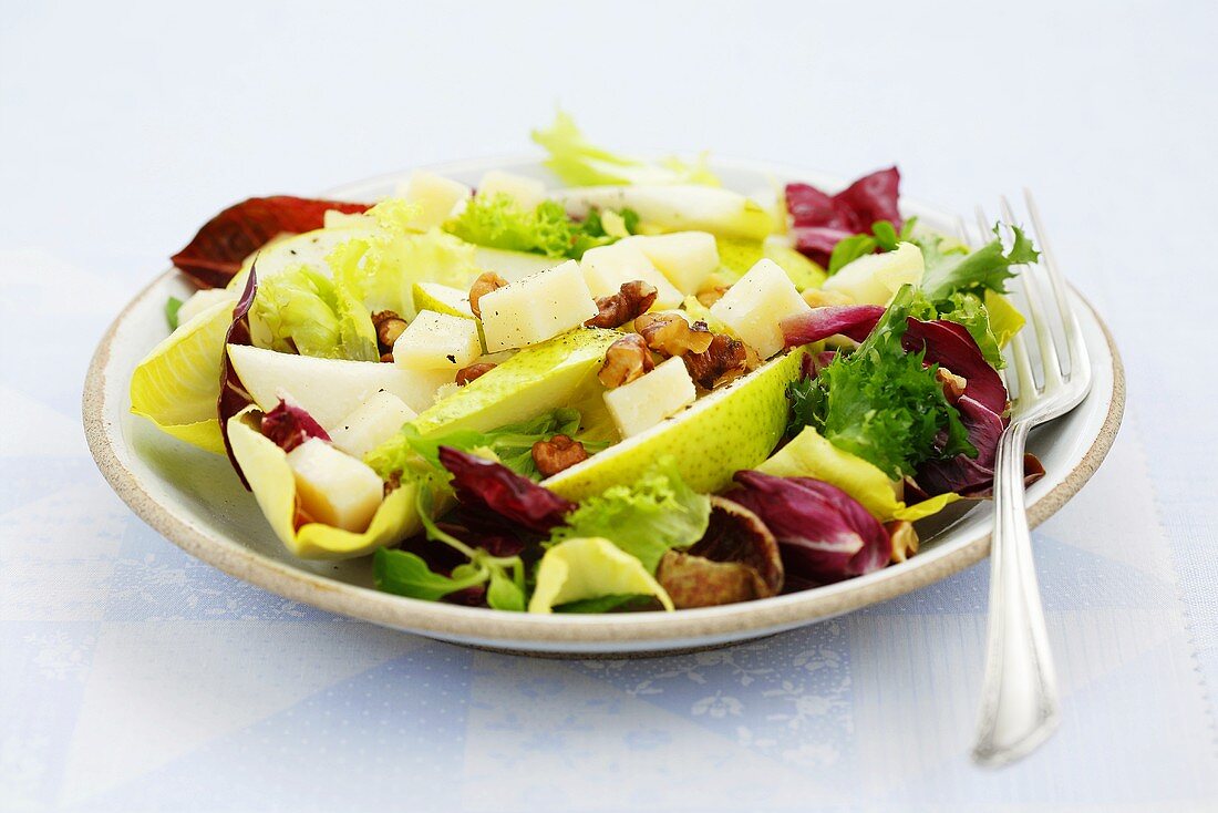 Pear and radicchio salad with pecorino and walnuts