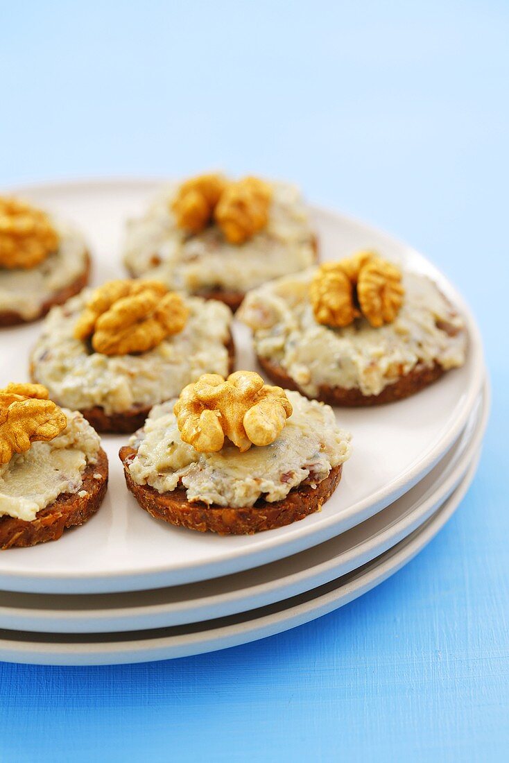 Canapes with tuna spread and walnuts