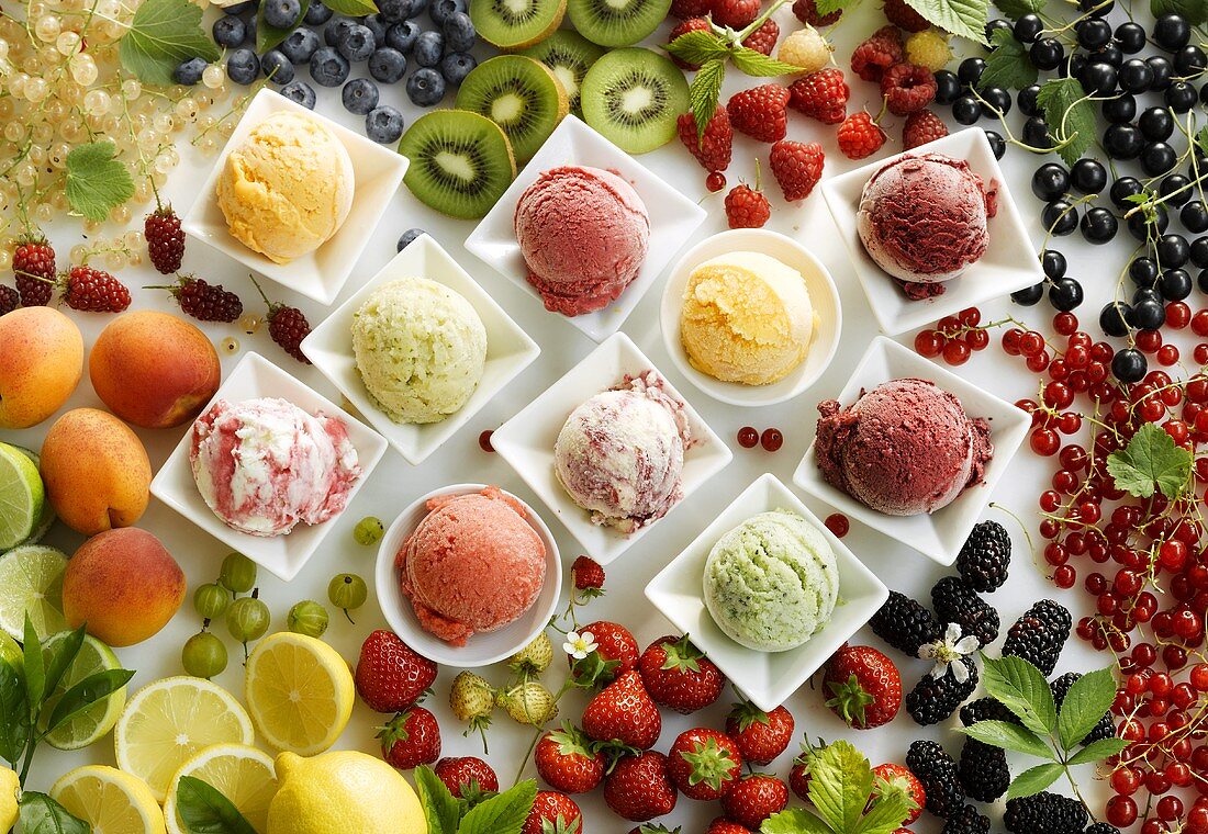 Various sorts of fruit ice cream with fresh fruit