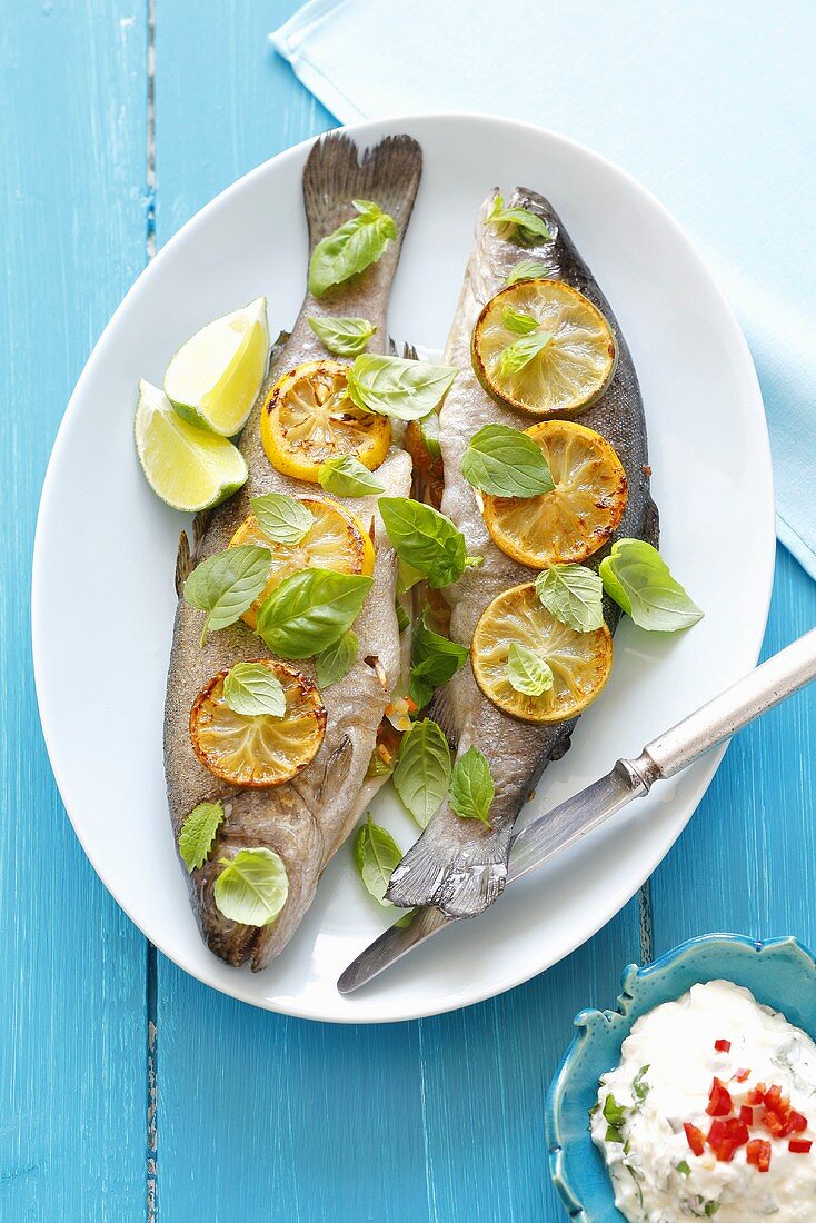 Stuffed trout with lemon slices