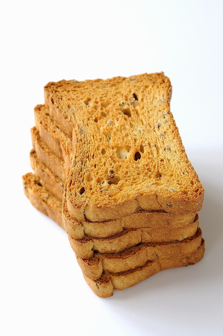 Several slices of whole grain zwieback, stacked