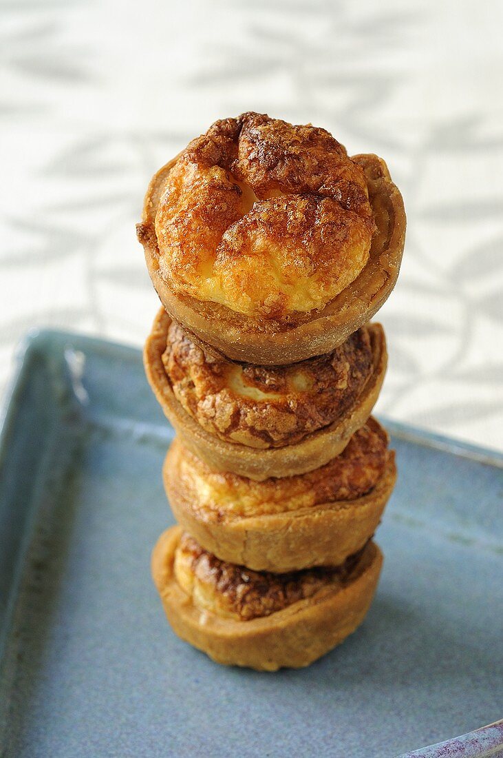 Savoury mini-quiches, stacked