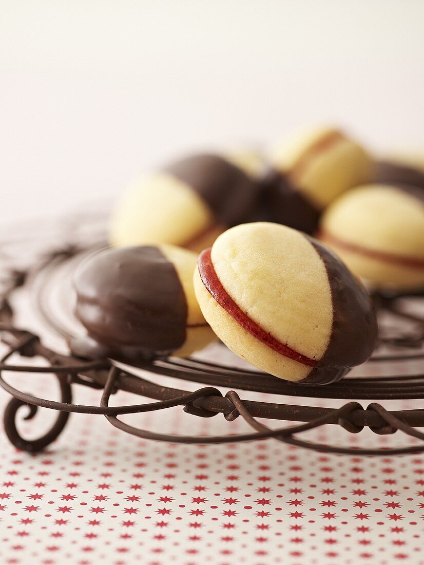 Chocolate-dipped Linzer biscuits