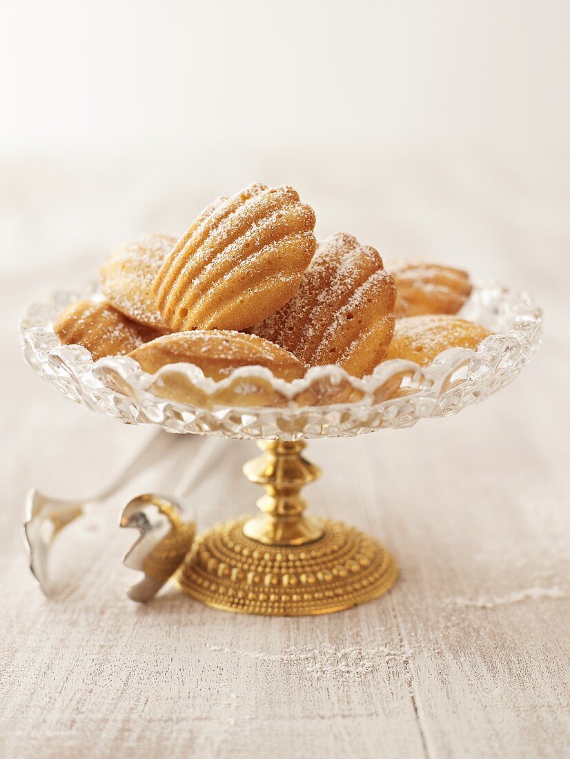 Madeleines on a glass cake stand