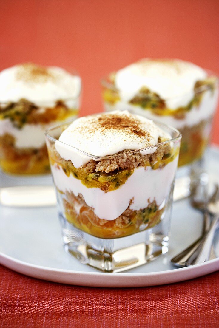 Layered dessert of couscous, fruit and cream