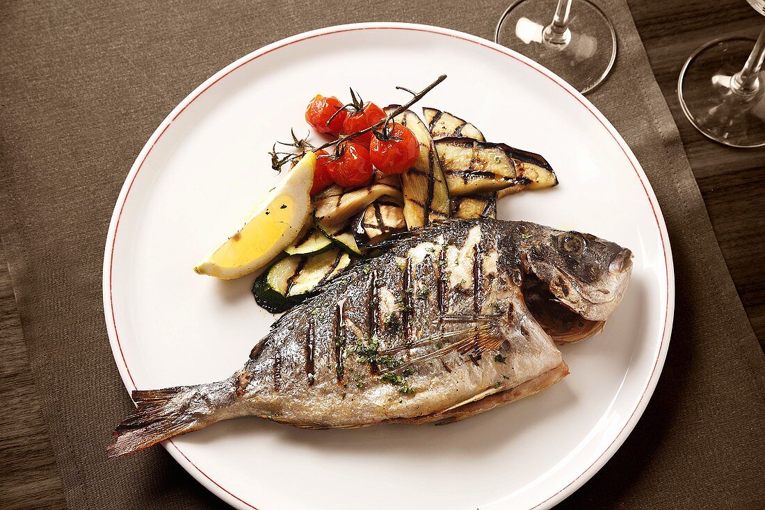 Grilled sea bream with aubergines