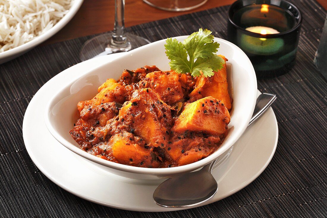 Bombay aloo (Potato and tomato dish with mustard seeds, India)