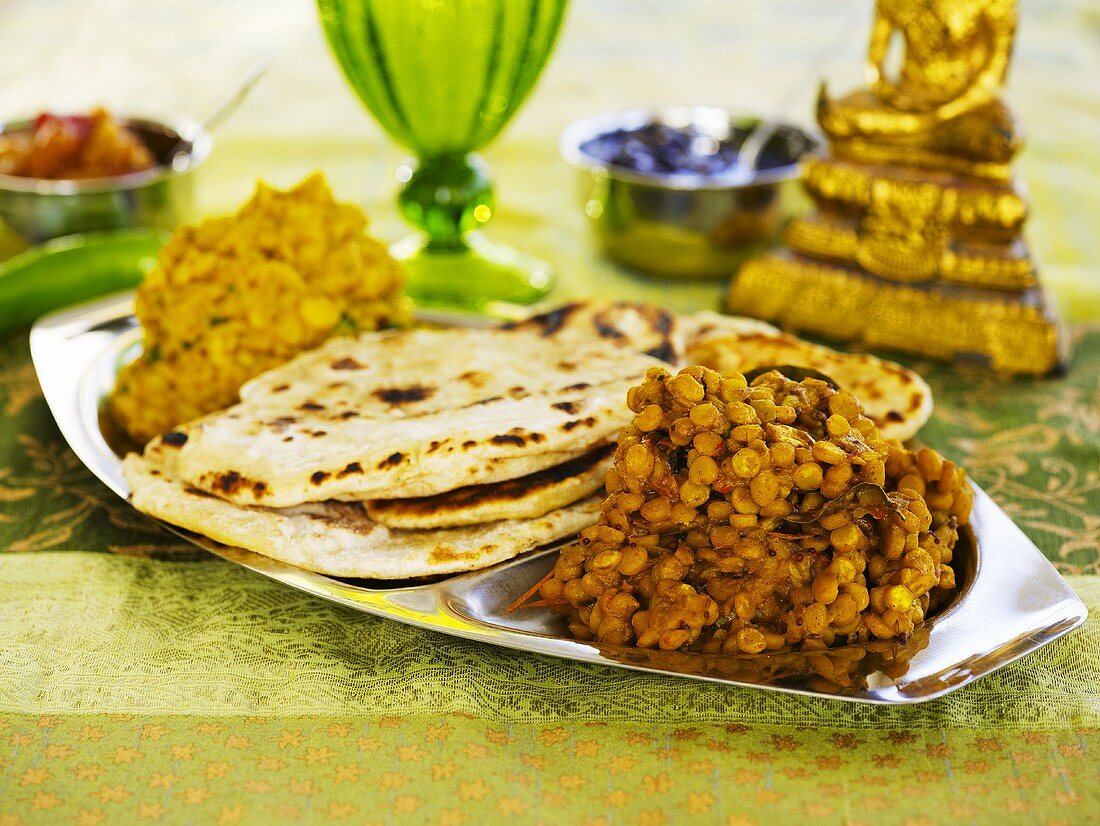 Indian lentil dish with naan bread