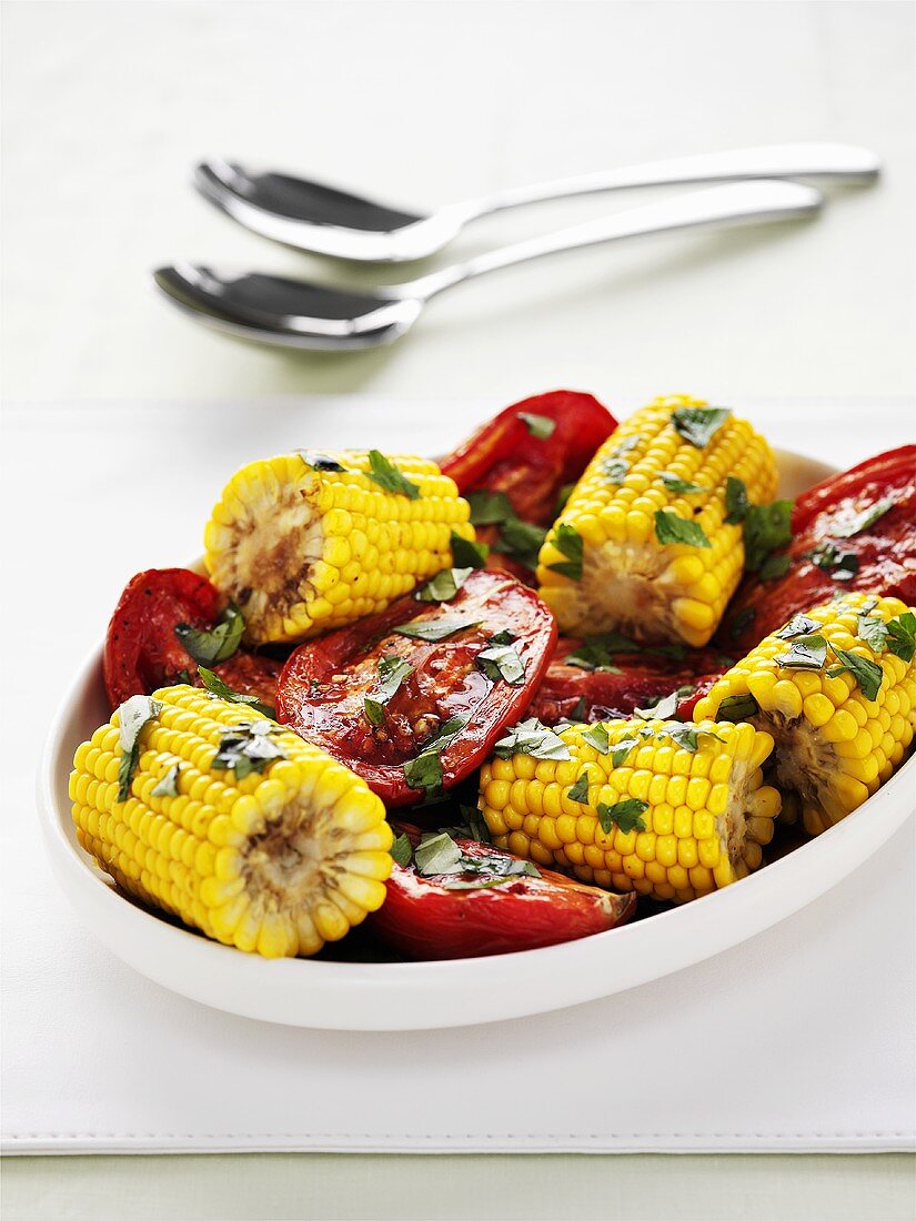 Fried tomatoes with corn on the cob