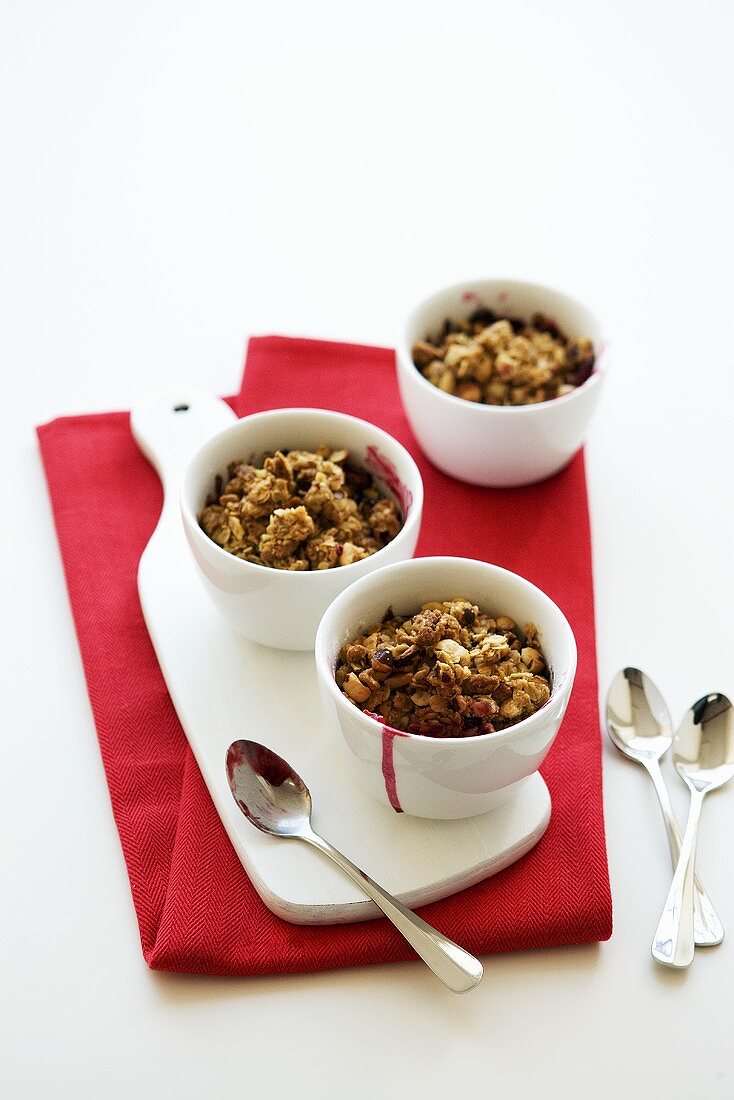 Individual raspberry crumbles in pots