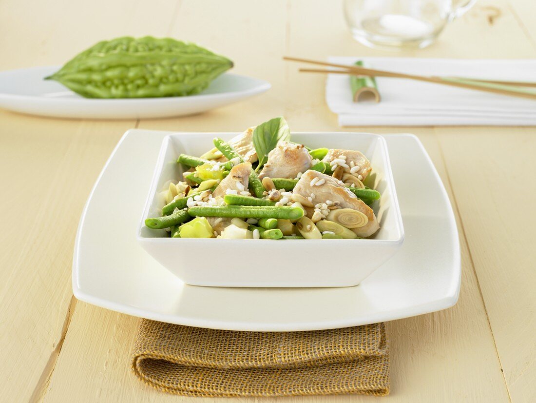 Rice with chicken breast, beans and bitter melon