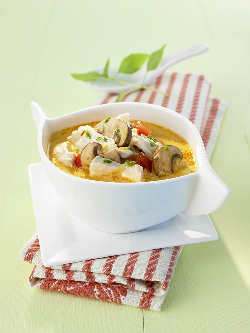 Spicy chicken stew with coconut and mushrooms