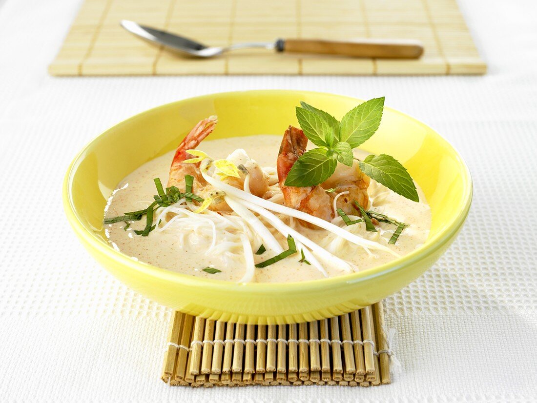 Prawn & coconut soup with ginger, rice noodles & soya sprouts