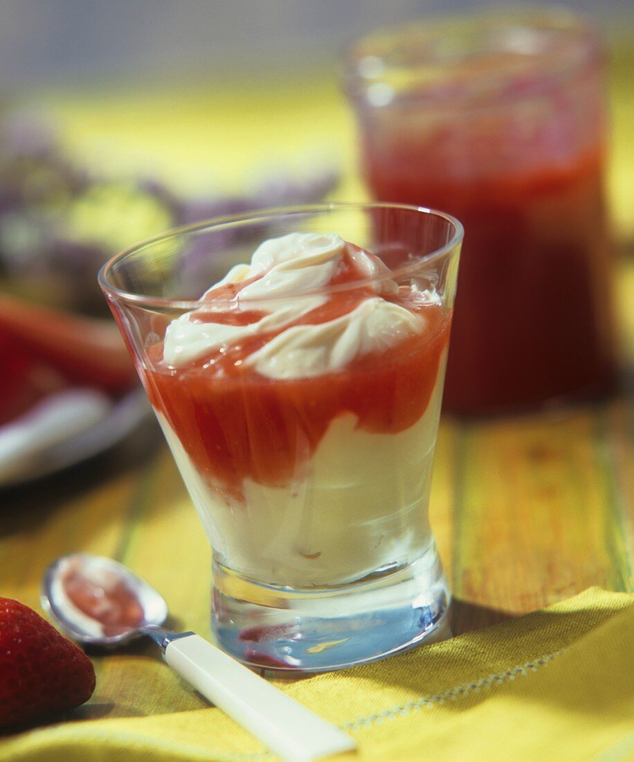 Cream dessert with strawberry and melon sauce