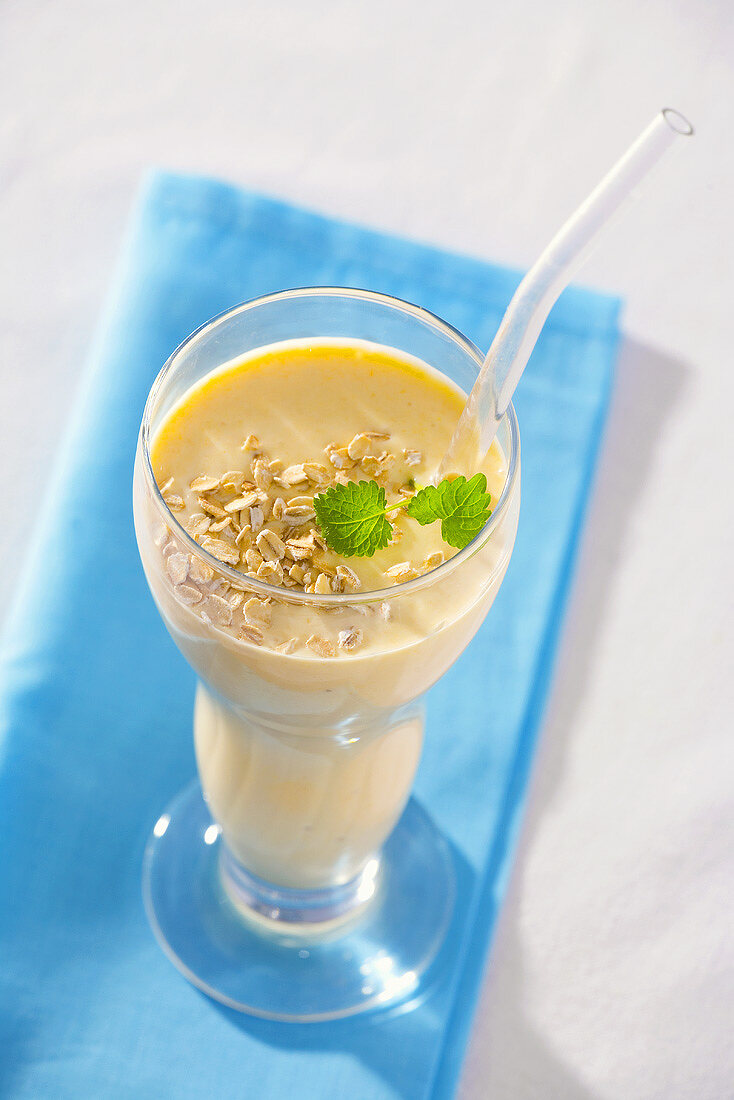 Orange and peach drink with rolled oats