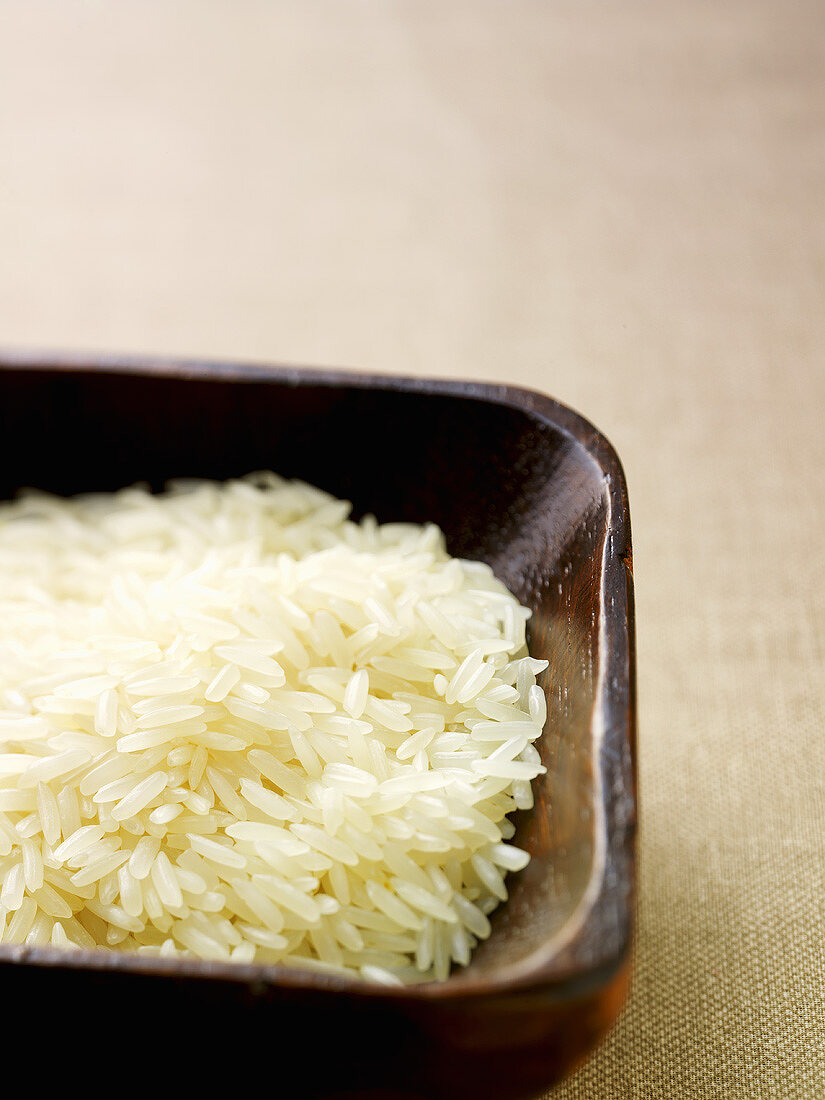 Basmati rice in wooden dish