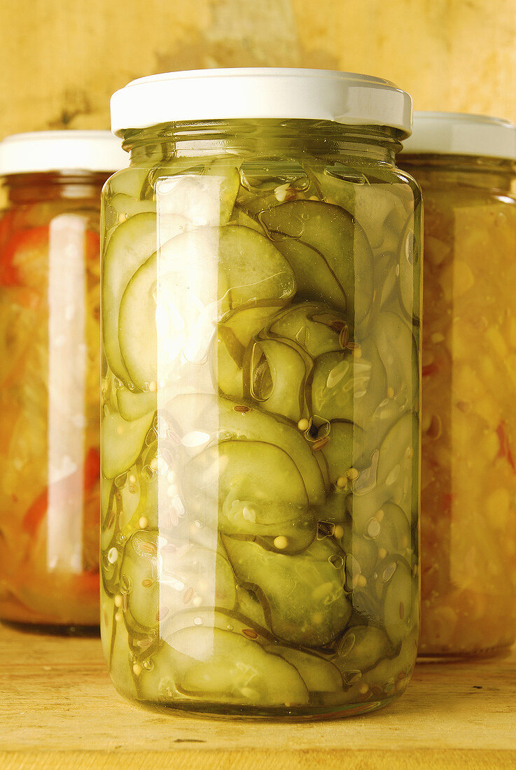 Pickled cucumber slices in a jar