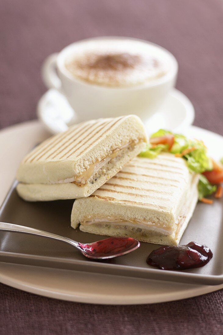 Toasted panini with cappuccino