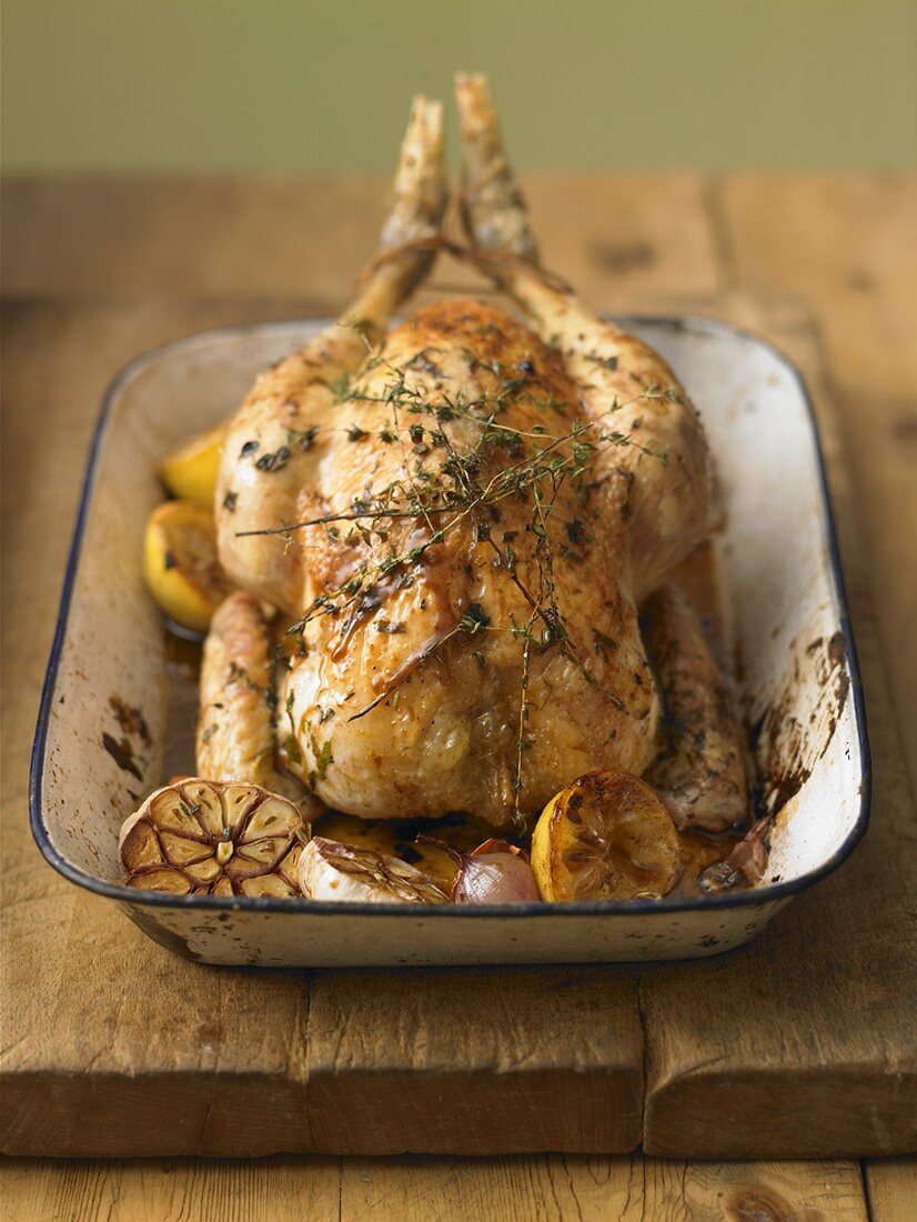Whole lemon chicken with garlic and thyme
