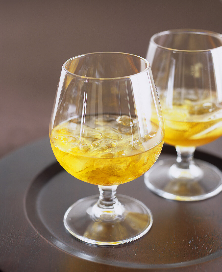 Orange brandy with ice cubes