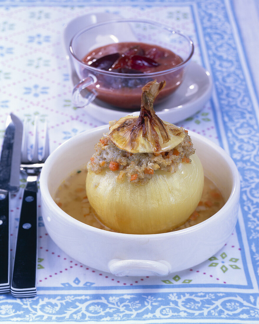 Onion with green spelt & vegetable stuffing & ginger plum sauce