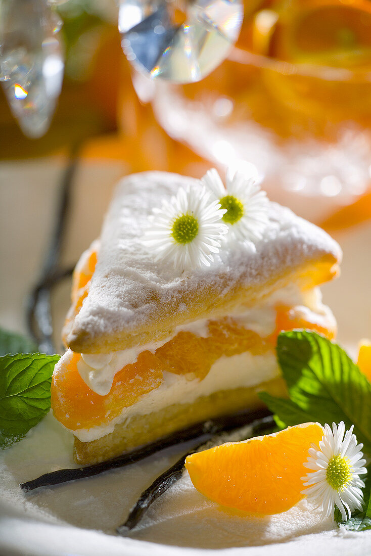 Napoleon slice filled with vanilla cream & tangerine segments