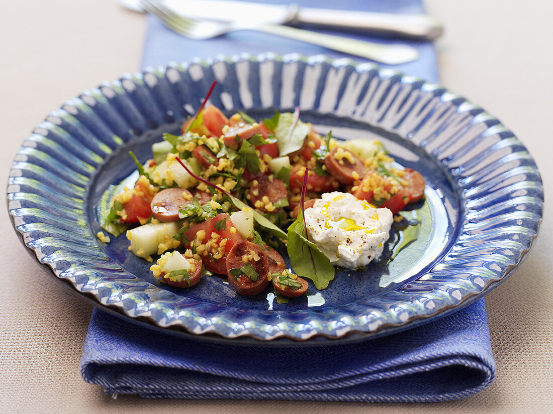 Couscous salad with sausage