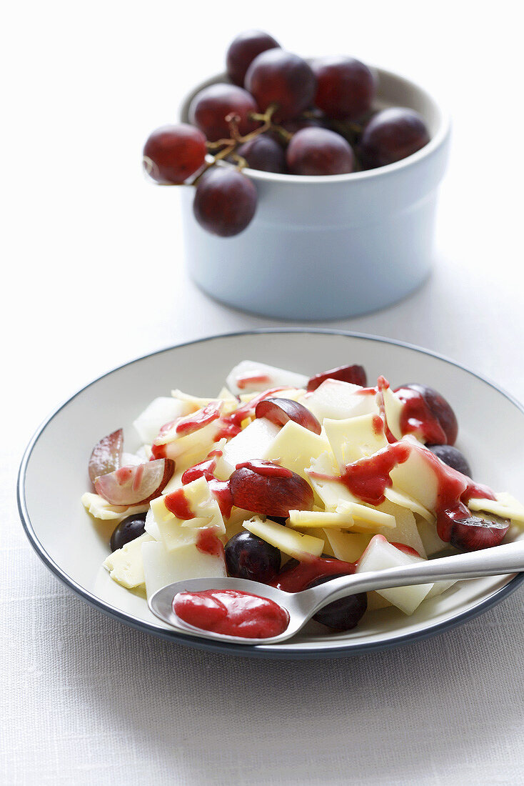 Cheese and grape salad with cherry dressing