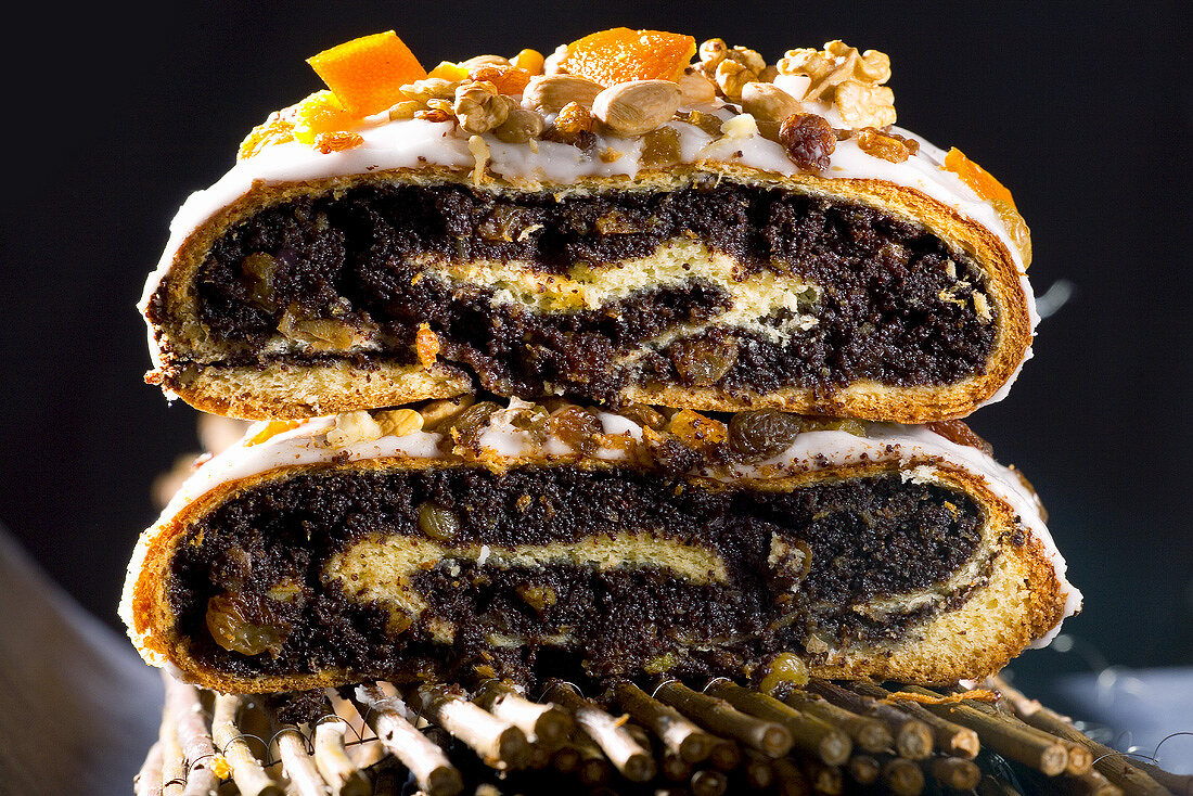 Polish poppy seed roll with icing and nuts