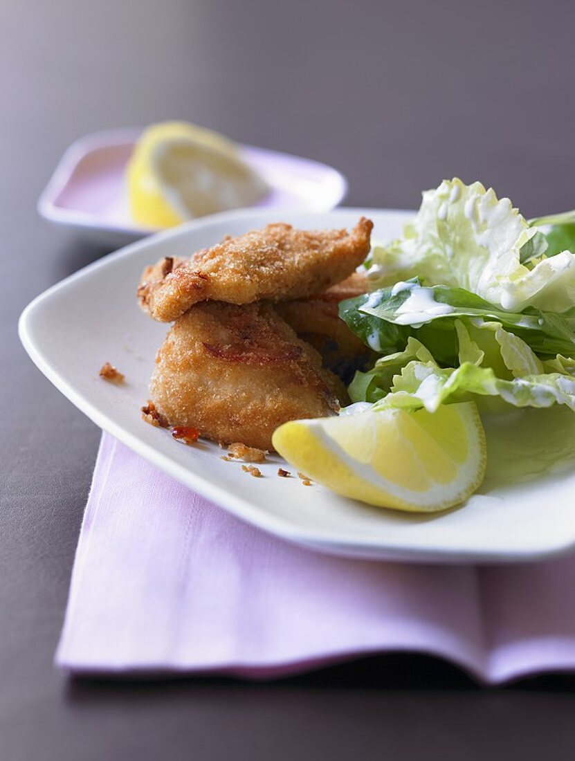 Fried lemon and chilli chicken with endive and corn salad