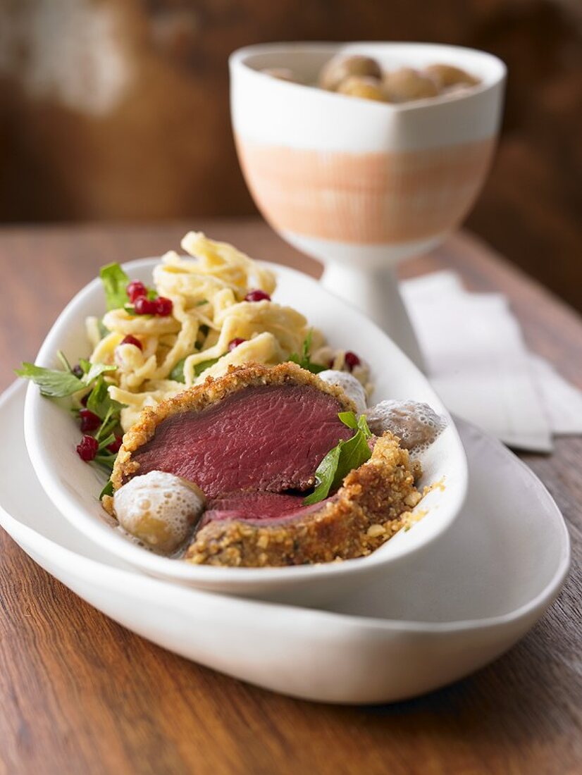 Loin of venison in hazelnut crust with glazed chestnuts