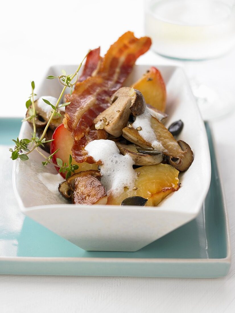 Fried ceps with peaches, bacon and thyme foam