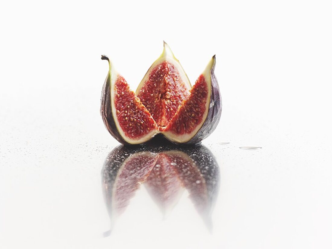 A fig, cut into three pieces