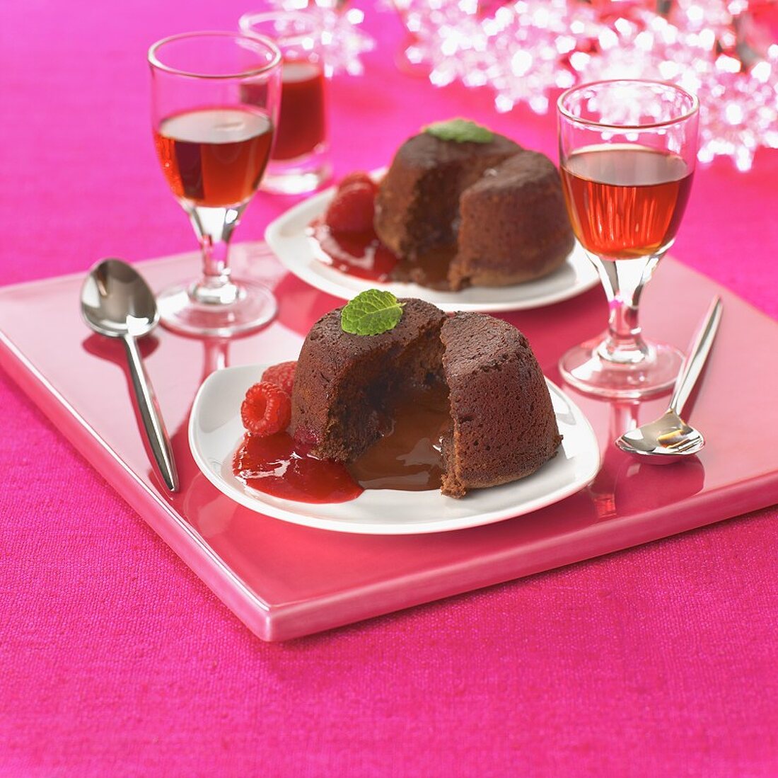 Chocolate pudding with raspberry sauce