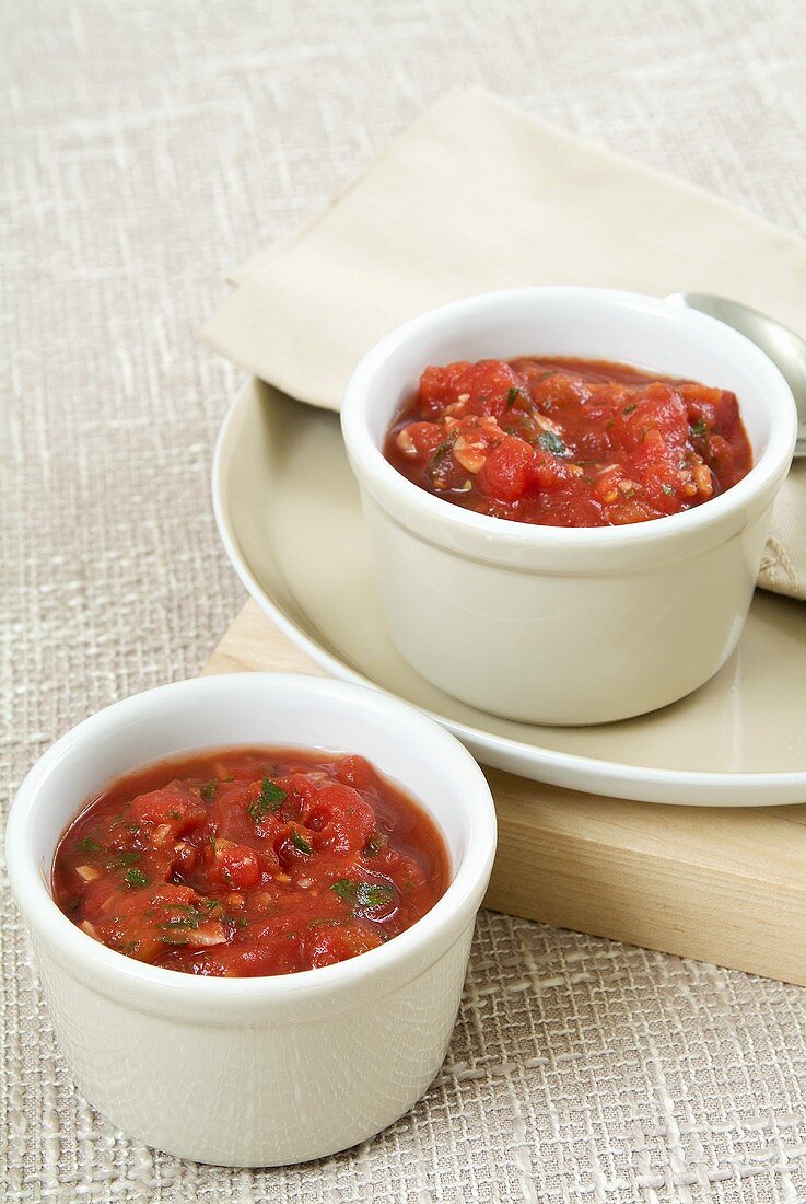 Tomato sauce in two ramekins
